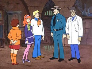 The image is of a character and content discussed in the text at Scooby-Doo.
The image is of lower resolution and quality than the original video (copies made from it will be of inferior quality).
No free or public domain images have been located for the subject.
The image does not limit the copyright owners' rights to distribute the show or DVDs in any way.
The image's inclusion in the article is important because it illustrates content discussed in the text, a recurring joke in the series.
The image is being used for informational purposes only. Source: https://en.wikipedia.org/wiki/File:Scooby-doo-meddling-kids-1970.jpg